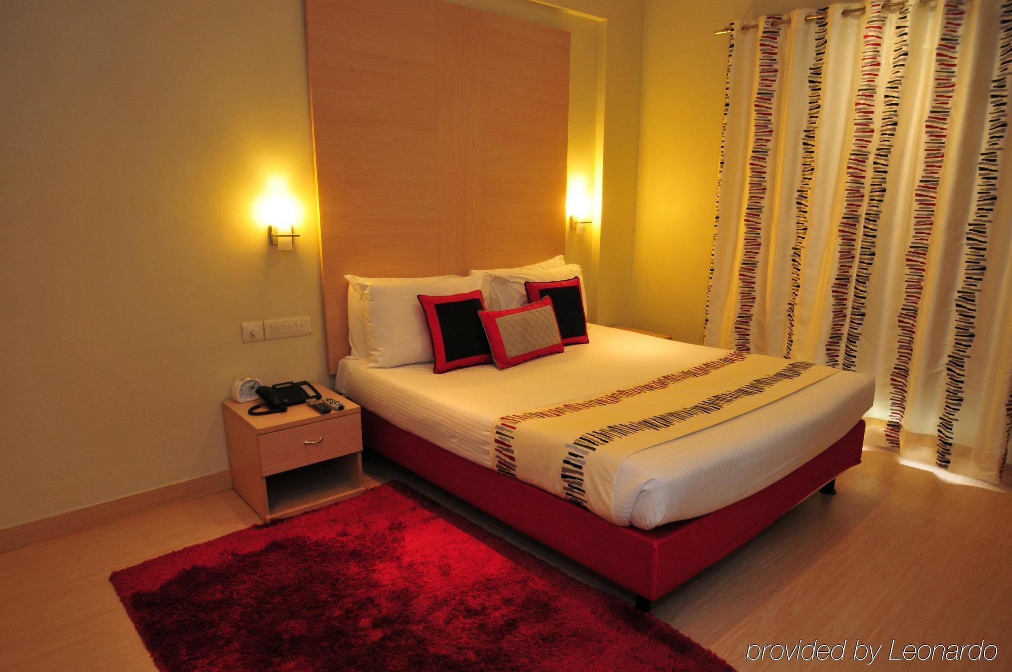 Avalon Courtyard Residence Suites Nova Deli Quarto foto