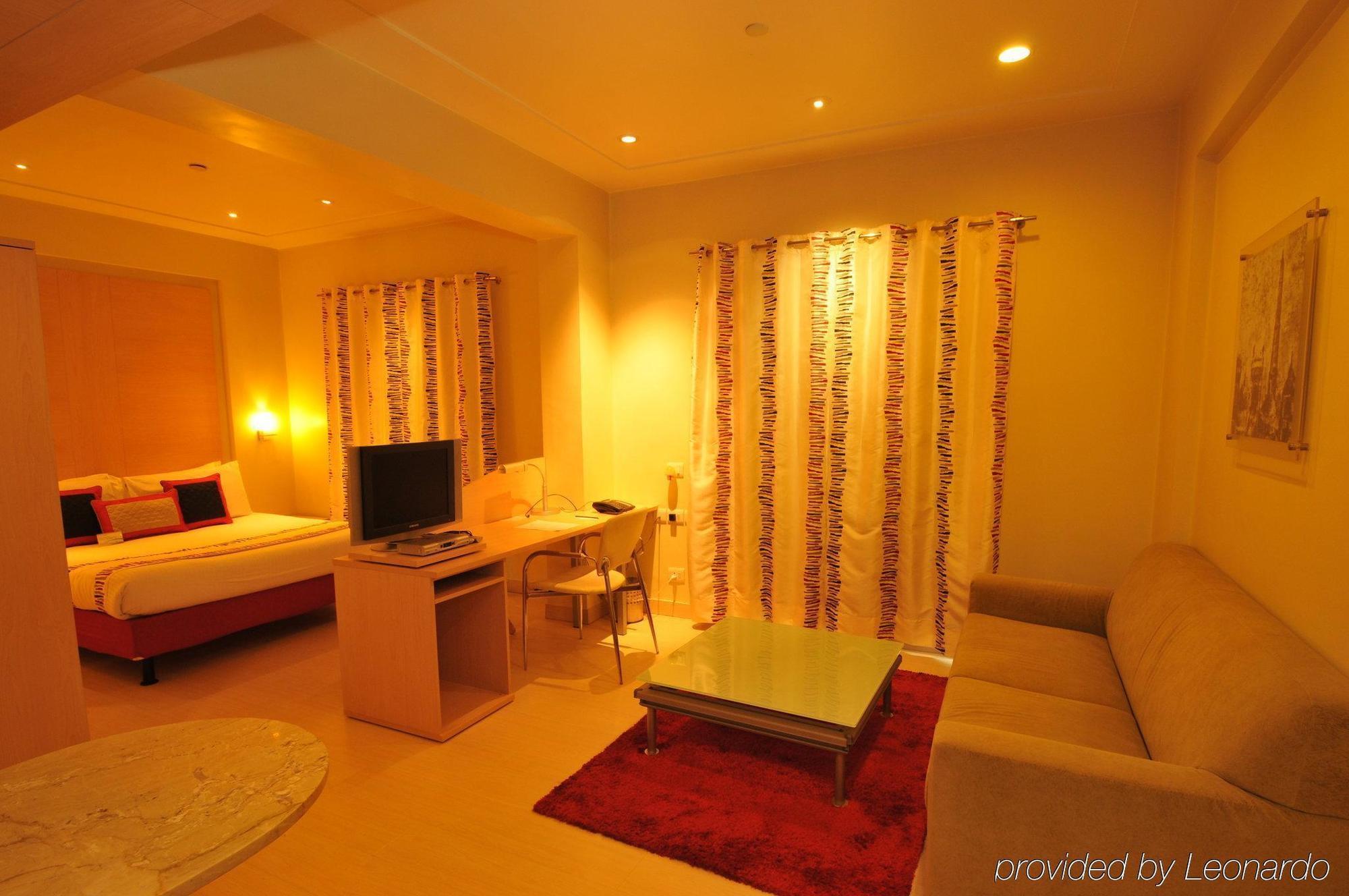 Avalon Courtyard Residence Suites Nova Deli Quarto foto